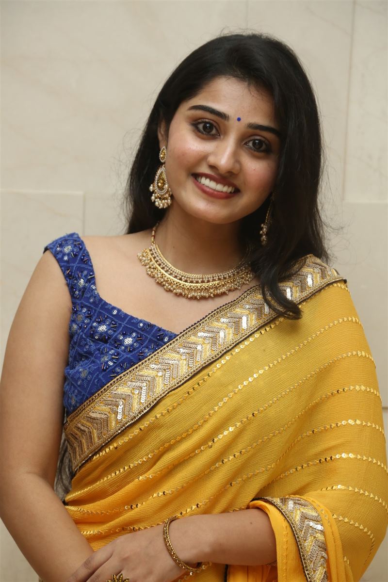 Telugu Actress Athira Raj Stills in yellow Saree